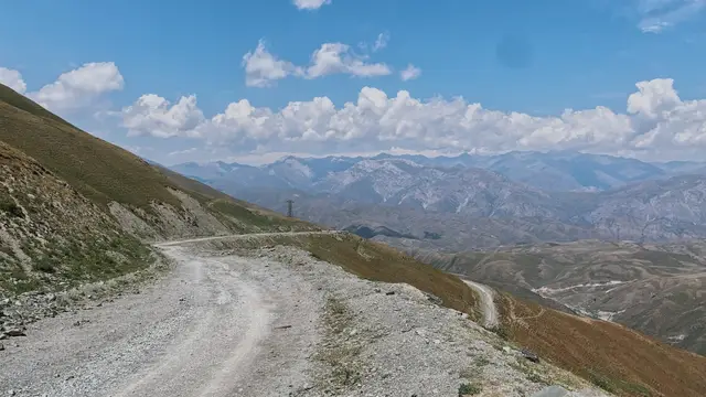 View of the Mountain Races roads, a wide track on a mountainside