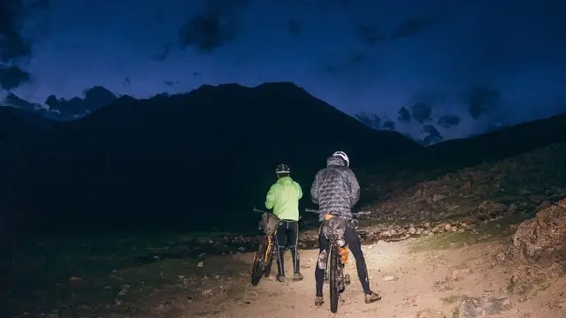 With another rider in a bikepacking race, before a night on the bike